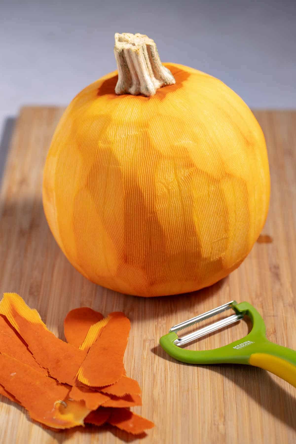 Whole, raw, peeled pumpkin.