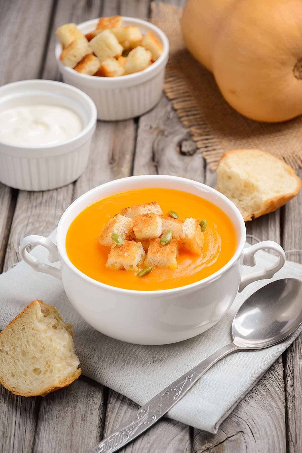 Bowl of soup with croutons.