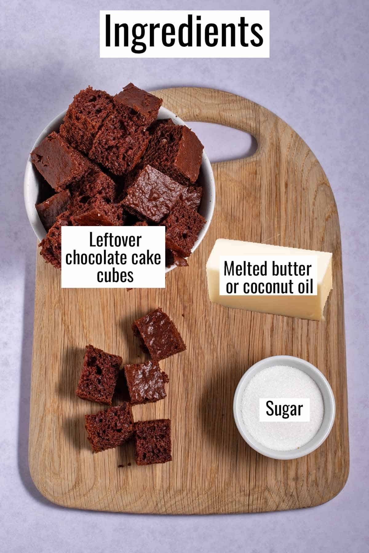Ingredients for chocolate cake croutons on a cutting board.
