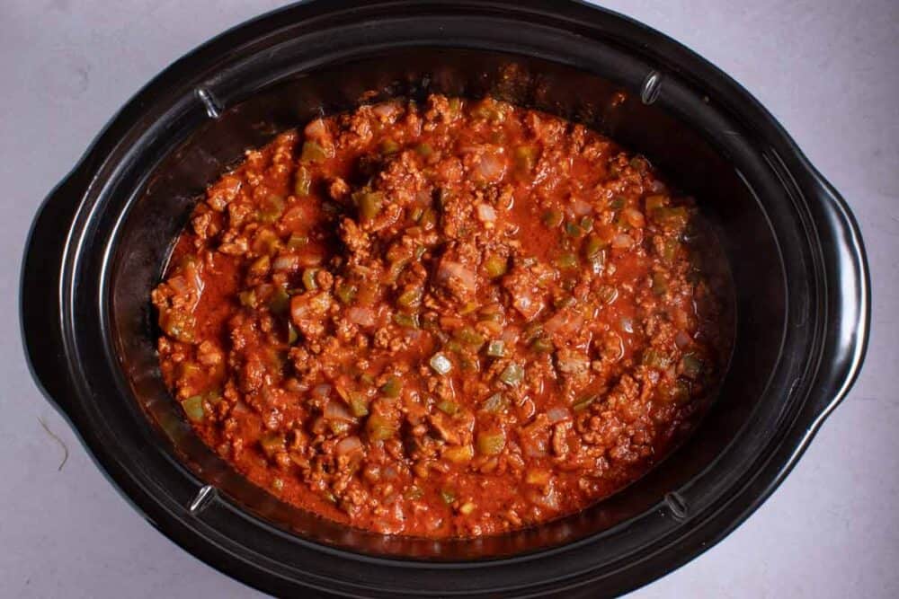 Sloppy joes being kept warm in a slow cooker.