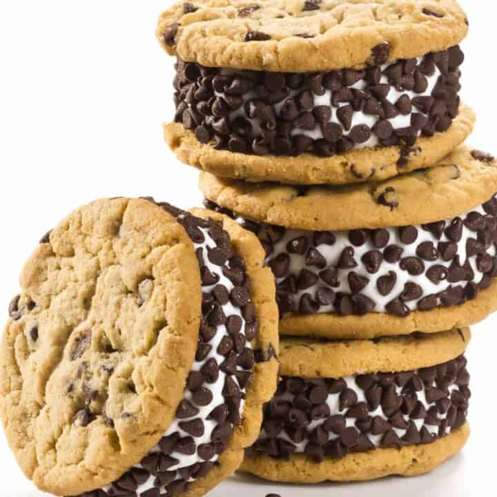 Stack of chocolate chip cookie ice cream sandwiches rolled in mini chocolate chips.