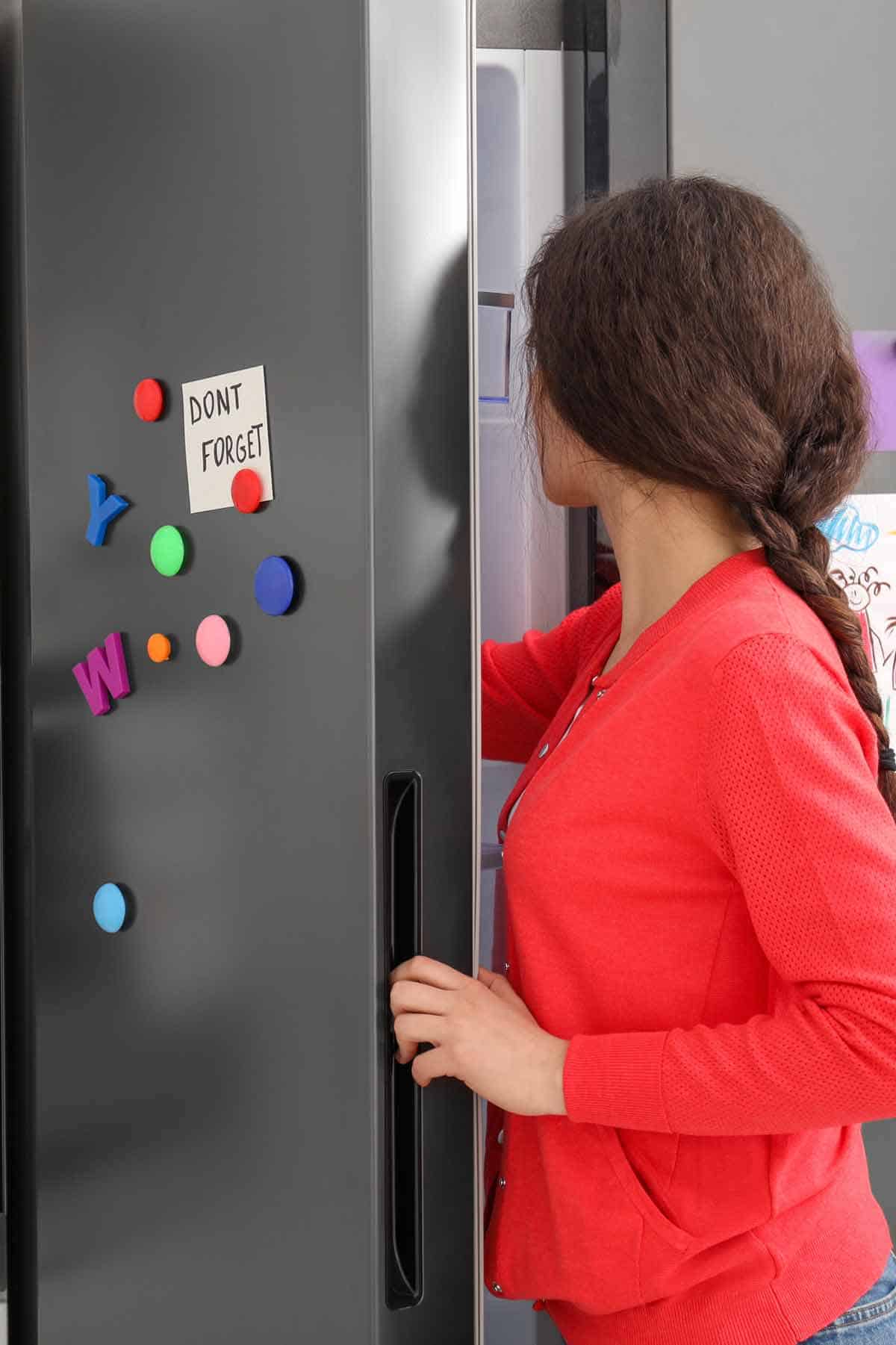 Storing leftovers in the refrigerator.