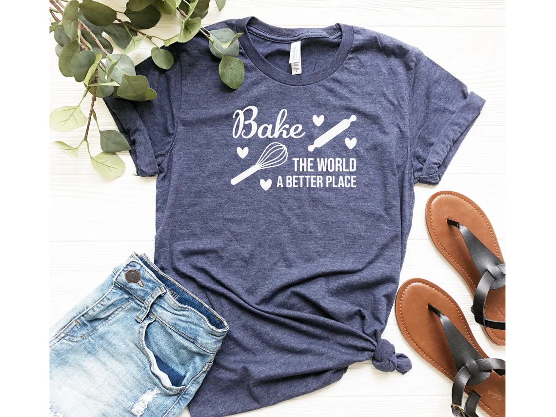 Tshirt that says "bake the world a better place".