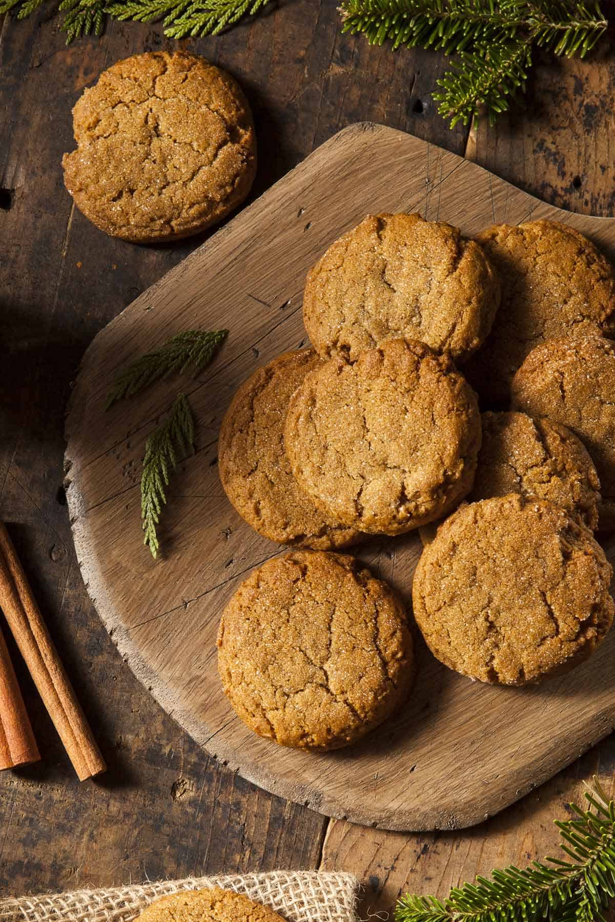 Gingersnap cookies on a serving board.