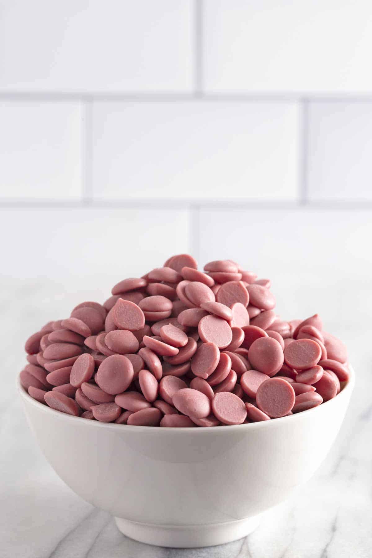 Big bowl of ruby chocolate chips.