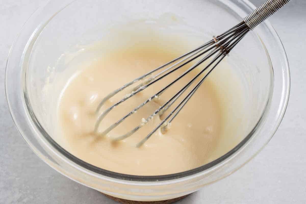 Bowl of melted white chocolate.