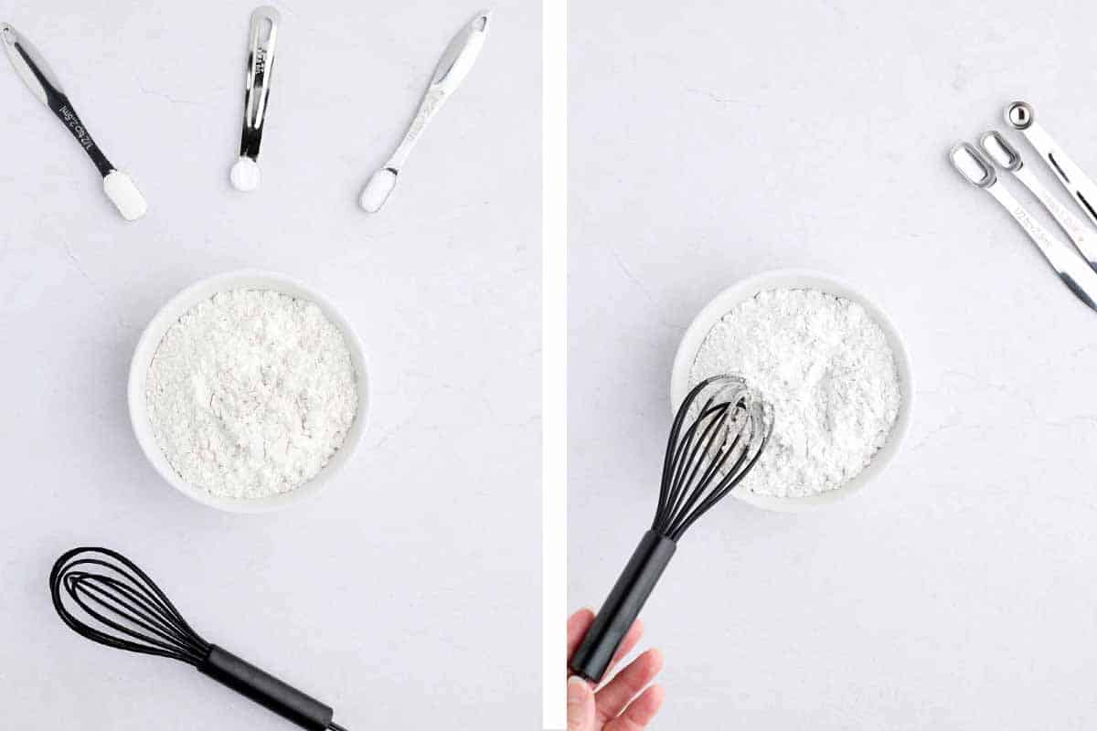 Bowl of flour with cream of tartar, salt, and baking soda in measuring spoons.