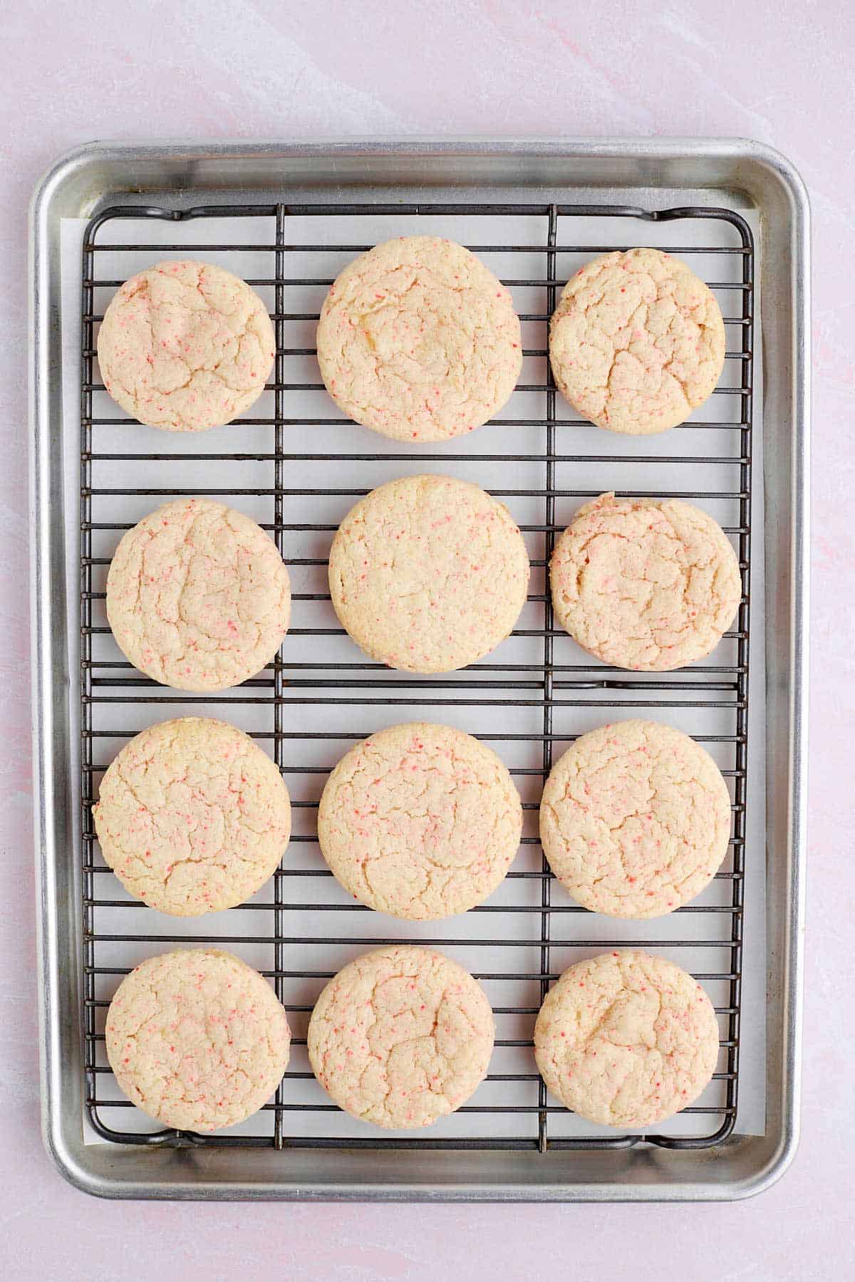 Baked cherry chip cake mix cookies cooling on a wire rack.