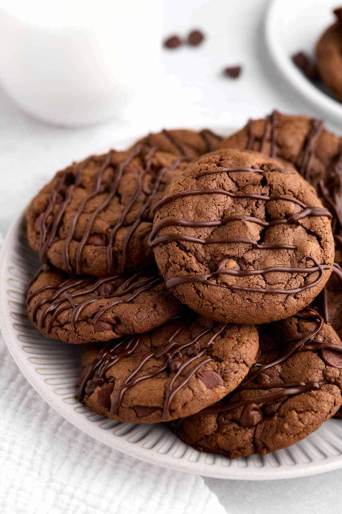 Overhead view of a plate of devil's food chocolate chip cookies.