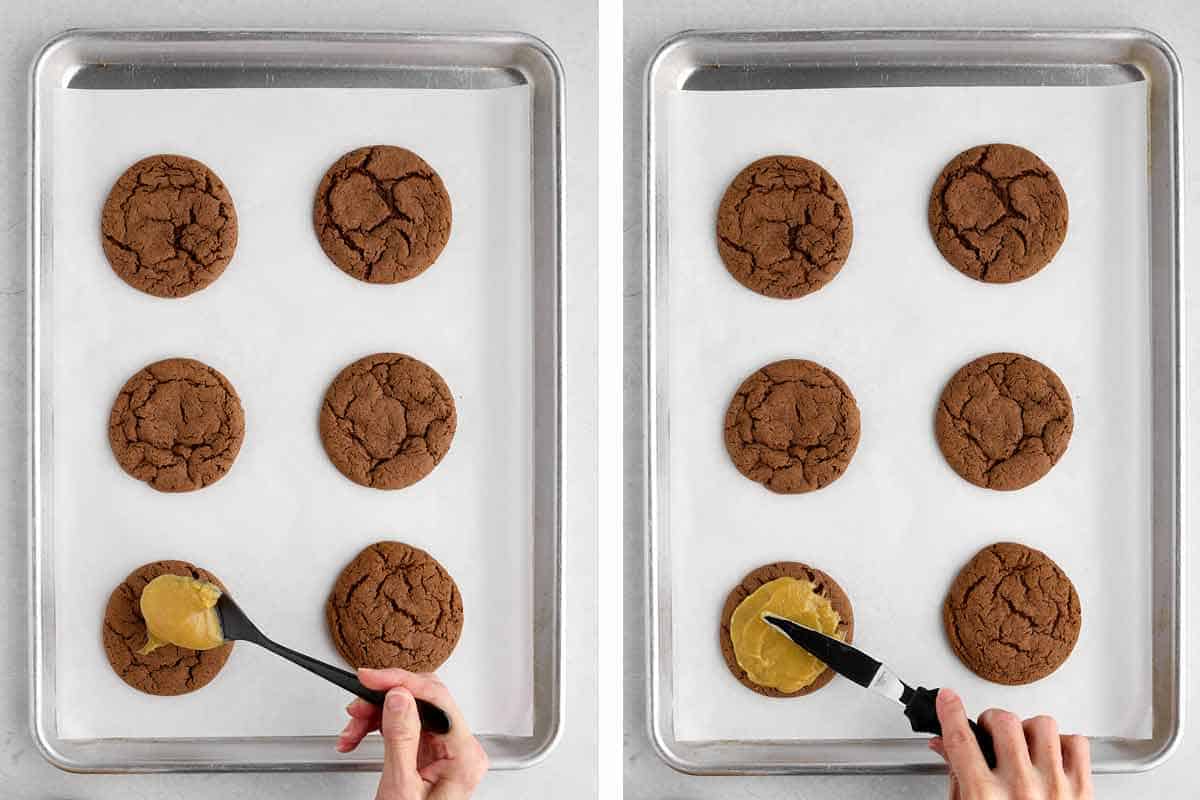 Spooning frosting onto German chocolate cookies and then smoothing the frosting with an offset spatula.