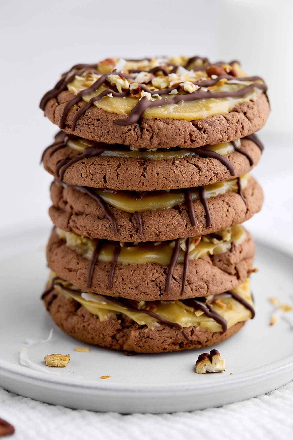 Tall stack of German cake mix cookies on a plate.