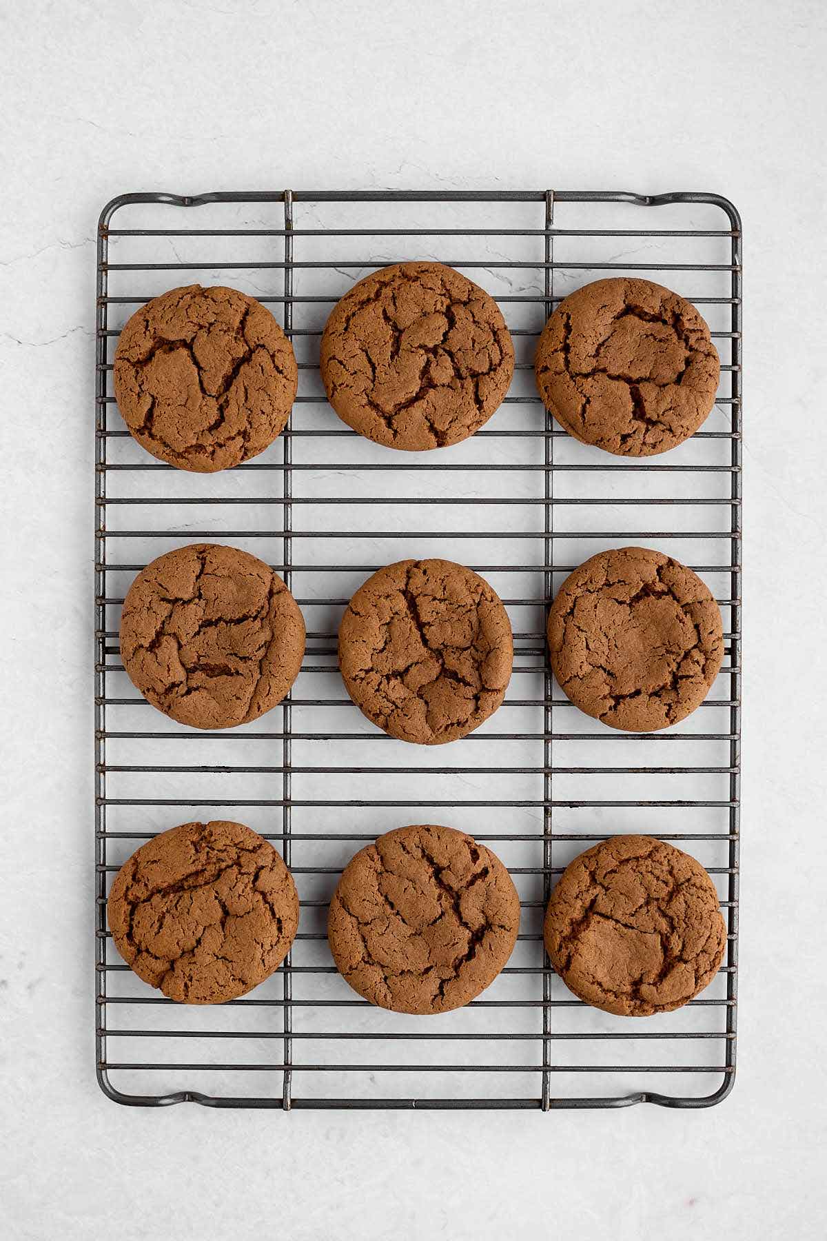 Cooling rack with baked German chocolate cookies.