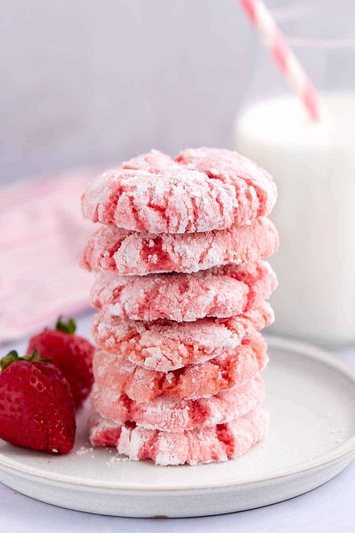 Stack of cake mix strawberry crinkle cookies on a plate.