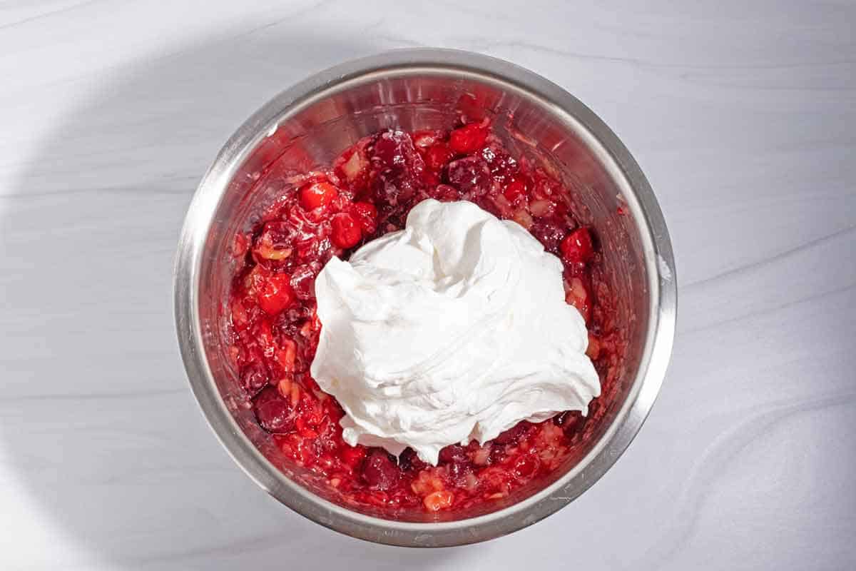 Cool Whip added to cherry fluff salad.