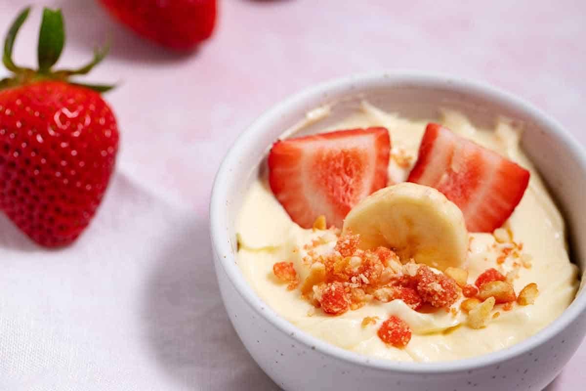 Small bowl with strawberry banana pudding.