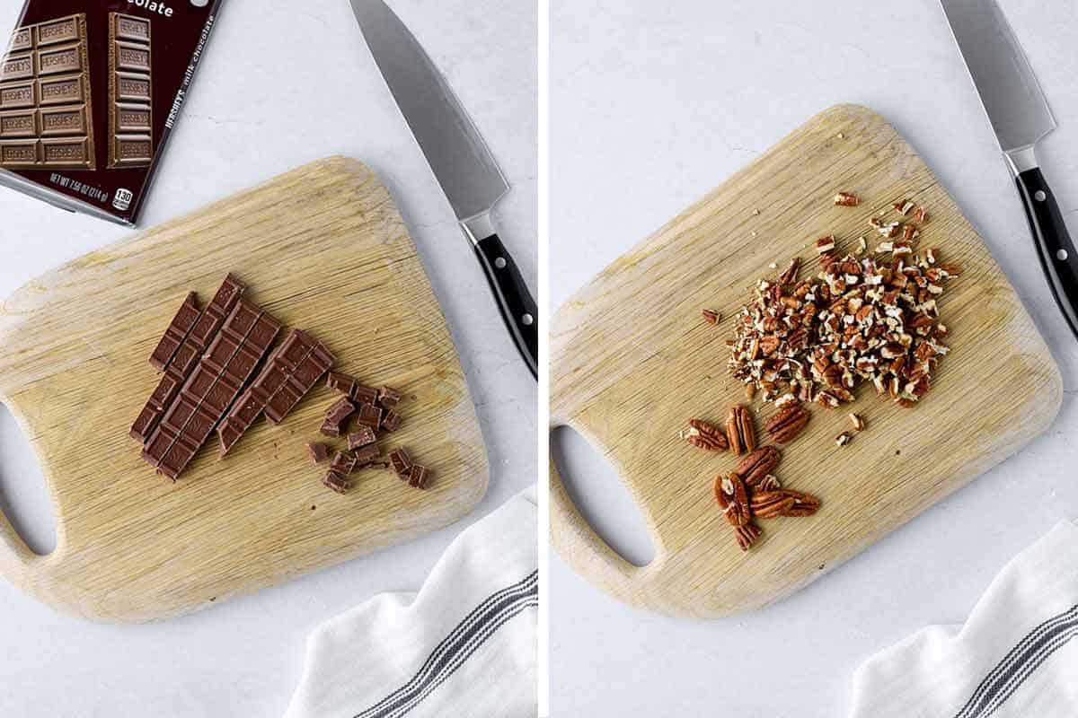 Cutting board with chopped Hershey bar and cutting board with chopped pecans.